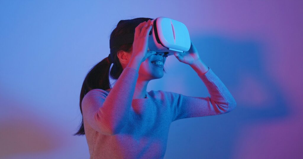 Woman look though the VR device